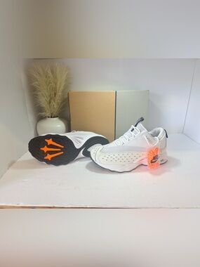 33. Nike Nocta, White  and Orange Sneakers women’s 9 or men’s 7.5